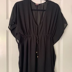 Medina woman’s swim coverup size small